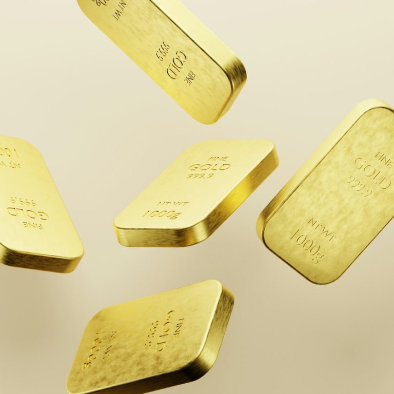Floating gold bars with engravings on a light background.